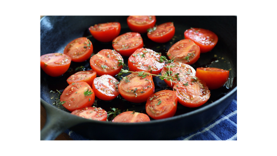 sauted tomatoes on cast iron skillet